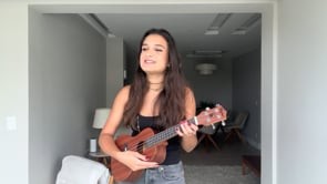 Vídeo cantando e tocando ukulele
